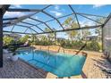 Relaxing screened pool and patio area, perfect for outdoor enjoyment at 25676 Prada Dr, Punta Gorda, FL 33955