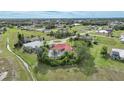 Aerial view of home showcasing its pool and location within the community at 26266 Barcelos Ct, Punta Gorda, FL 33983