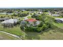 Aerial view of the house highlighting its pool and private backyard at 26266 Barcelos Ct, Punta Gorda, FL 33983