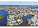 Wide shot of waterfront community with many houses at 4557 Colleen St, Port Charlotte, FL 33952