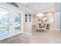 Bright dining room with a round table and four chairs at 70 Marker Rd, Rotonda West, FL 33947