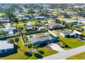 Aerial view of a house with a pool and large backyard at 221 E Wentworth St, Englewood, FL 34223