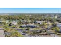 Aerial view of condo community with landscaping and a pool at 4260 Placida Rd # 24B, Englewood, FL 34224