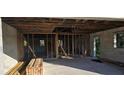 Uncompleted interior with framed walls and exposed beams at 5306 Jennings Blvd, Port Charlotte, FL 33981