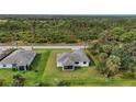 New construction home with a large backyard and screened patio at 5400 Jennings Blvd, Port Charlotte, FL 33981