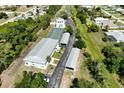 Community features tennis courts, pool, and parking at 8050 Memory Ln # 104, Rotonda West, FL 33947