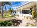 Single story house with a covered porch at 810 Harvard St, Englewood, FL 34223