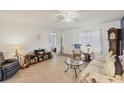 Spacious living room offering ample seating and natural light at 9261 Saint Catherine Ave, Englewood, FL 34224
