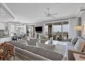 Open living space with water views and comfortable seating at 13213 Gasparilla Rd # B601, Placida, FL 33946