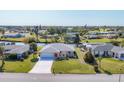 Bird's-eye view of a single-Gathering home with a spacious yard at 162 Annapolis Ln, Rotonda West, FL 33947