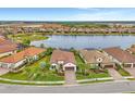 Bird's eye view of a beautiful home nestled in a charming neighborhood at 26837 Weiskopf Dr, Englewood, FL 34223