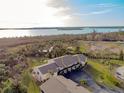 Waterfront community with lush landscaping and condo units at 4260 Placida Rd # 12C, Englewood, FL 34224