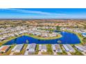 Expansive aerial view of a lakefront community at 812 Seabrooke Dr, Englewood, FL 34223