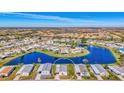 Bird's-eye view of a mobile home near a lake at 812 Seabrooke Dr, Englewood, FL 34223