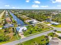 Bird's eye view of home, showing location and canal access at 10322 Sunbury Dr, Port Charlotte, FL 33981