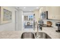Updated kitchen with granite counters and stainless steel appliances at 5700 Gulf Shores Dr # B234, Boca Grande, FL 33921