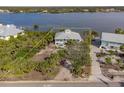 Waterfront property with a spacious lot and private dock at 8245 Manasota Key Rd, Englewood, FL 34223
