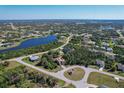 Home situated on a quiet street near a lake at 117 Cable Dr, Rotonda West, FL 33947