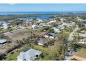 Breathtaking aerial view of a waterfront community with stunning ocean views at 235 Capstan Dr, Placida, FL 33946