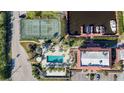 Complex with pool, tennis court, and boat slips at 25188 Marion Ave # C206, Punta Gorda, FL 33950