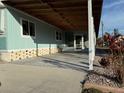 Covered patio with concrete flooring and a screened enclosure at 8194 Robert St, Englewood, FL 34224