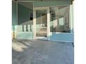 Screened porch entrance to the mobile home at 8194 Robert St, Englewood, FL 34224