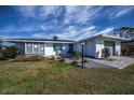 Newly renovated home with gray accents and coastal decor at 30 Oakland Hills Pl, Rotonda West, FL 33947