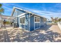 A large, spacious deck surrounds this beautiful home with large windows for lots of natural light at 331 Bocilla Dr, Placida, FL 33946
