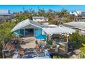Deck with hot tub, pergola, and outdoor seating area at 8888 Bay St, Placida, FL 33946