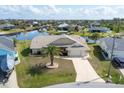 Attractive home on canal with lush landscaping at 9238 Melody Cir, Port Charlotte, FL 33981