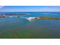 Panoramic aerial view of waterfront condo, bridge and intercoastal waterway at 1375 Beach Rd # 109, Englewood, FL 34223