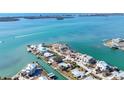 Scenic aerial view of the waterfront neighborhood, showing canals and nearby ocean access at 1906 Mississippi Ave, Englewood, FL 34224