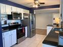 Updated kitchen, featuring stainless steel appliances and dark countertops at 4701 22Nd N Ave, St Petersburg, FL 33713