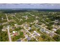 Residential neighborhood with single-Gathering homes and lush green landscaping at 8126 Chesebro Ave, North Port, FL 34287