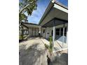 House exterior with carport and covered entryway at 3967 Arkansas Ne Ave, St Petersburg, FL 33703