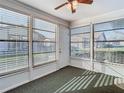 Sunroom featuring ample natural light and window blinds at 4531 Blossom Blvd # 4531, Zephyrhills, FL 33542