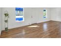 Spacious living area with hardwood floors and ample natural light at 1106 Powell St, Plant City, FL 33563