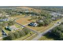 Aerial view showing house location and property lines at 14818 Grady Sweat Ln, Wimauma, FL 33598