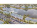 Aerial of waterfront community with lake and parking at 190 Pompano Se Dr # A, St Petersburg, FL 33705