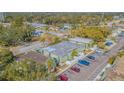 Aerial view of condo complex showcasing building arrangement and parking lot at 1799 N Highland Ave # 26, Clearwater, FL 33755