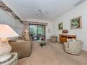 Bright and airy living room, featuring a comfortable seating area at 4522 Cancello Grande Ave, Venice, FL 34293