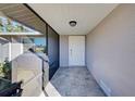 Screened-in entryway with tiled floor at 1358 Leawood Rd, Englewood, FL 34223