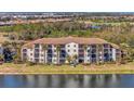 Condo building with water access and lush landscaping at 17108 Vardon Ter # 308, Bradenton, FL 34211