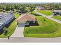 Bird's-eye view of a single story home, showcasing the property's curb appeal at 9325 Crugar Ter, Englewood, FL 34224