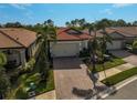 Aerial view of a single-story home in a community with similar houses at 125 Soliera St, Nokomis, FL 34275