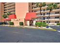 Well maintained building entrance with covered walkway and benches at 232 Saint Augustine Ave # 404, Venice, FL 34285