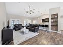 Open concept living room and kitchen with hardwood floors at 3328 Waterloo Ter, North Port, FL 34286