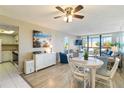 Open concept living and dining area with a view of the kitchen at 612 Bird Bay S Dr # 309, Venice, FL 34285