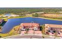 Luxury townhome with lake view; desirable waterfront location at 10217 Staggerbush Dr # 202, Venice, FL 34293