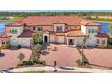 Attractive townhome community; multiple units with brick pavers at 10217 Staggerbush Dr # 202, Venice, FL 34293